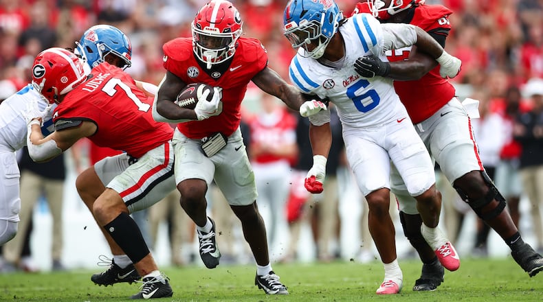 FILE - Georgia running back Nate Frazier (3) runs with the ball during the first half of an NCAA college football game against Mississippi, Saturday, Oct. 18, 2025, in Athens, Ga. (AP Photo/Colin Hubbard, File)