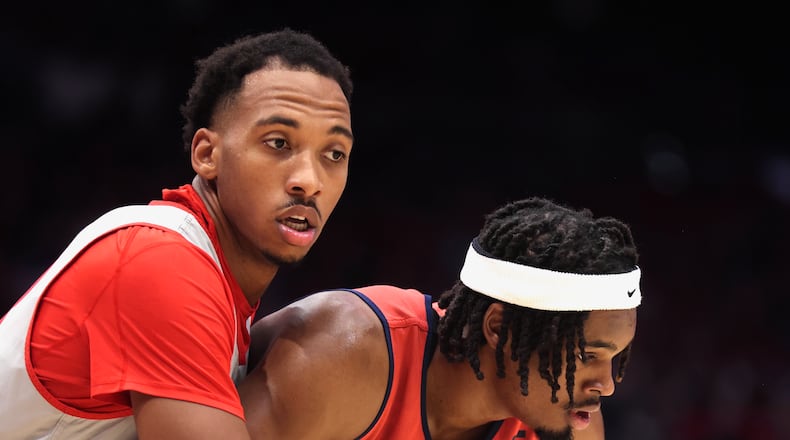 Ohio State's Zed Key, left, blocks out Dayton's DaRon Holmes II on a free-throw attempt during an exhibition on Sunday, Oct. 22, 2023, at UD Arena. David Jablonski/Staff