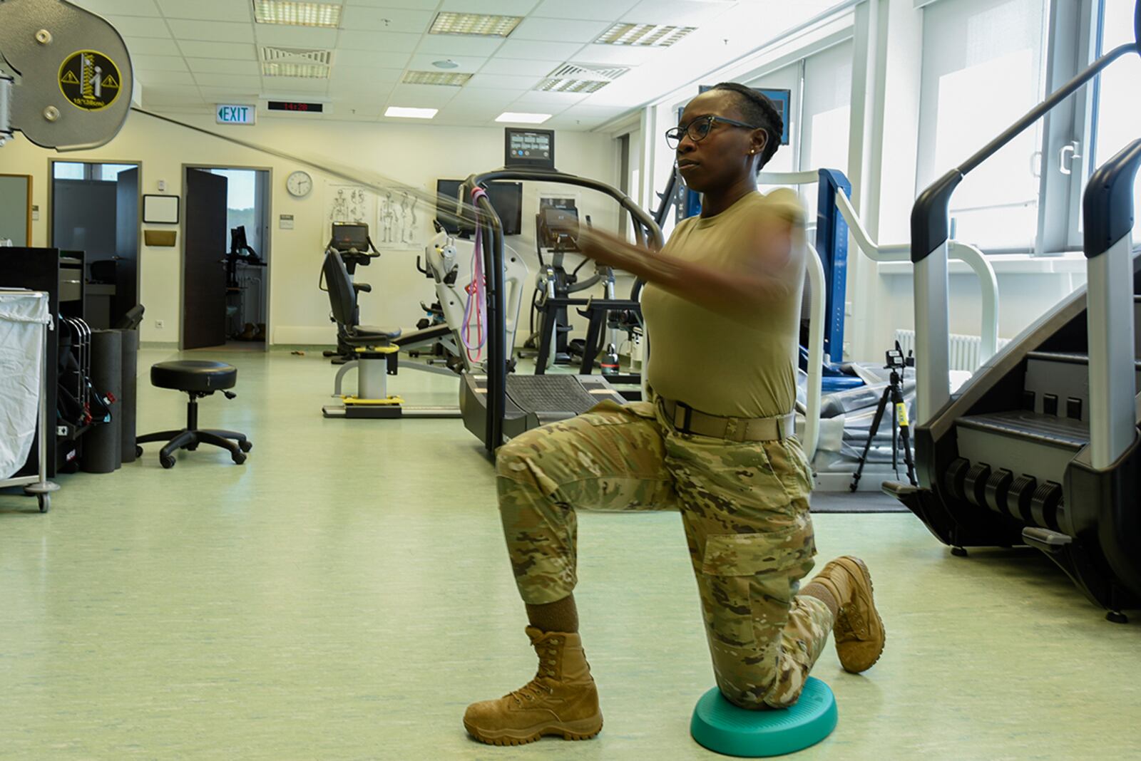 Staff Sgt. Lashawn Dennis, 52nd Fighter Wing NCO in charge of the wing professional development office, performs a physical therapy exercise in the medical clinic at Spangdahlem Air Base, Germany, June 14. Physical therapy allows Airmen to work through their injuries and provides tools for prevention in the future. U.S. AIR FORCE PHOTO/STAFF SGT. CHANCE NARDONE