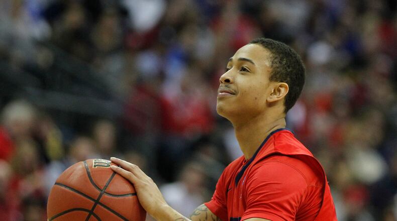 Dayton's Kyle Davis scores the Flyers' first points at the free-throw line against Providence in the second round of the NCAA tournament on Friday, March 20, 2015, at Nationwide Arena in Columbus. David Jablonski/Staff