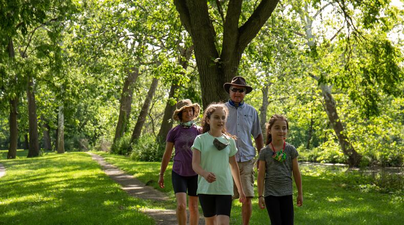 A walk outdoors is something the whole family can enjoy together. Outdoor activity promotes physical and mental wellness. CONTRIBUTED PHOTO FIVE RIVERS METROPARKS