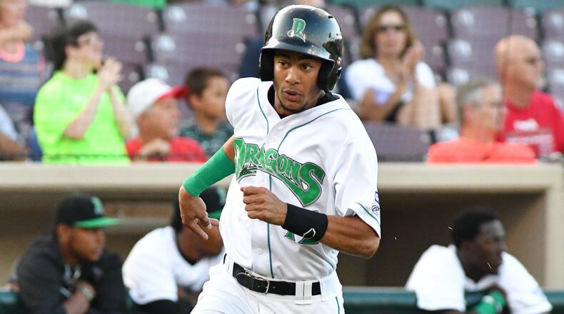 Dragons center fielder Jose Siri runs to home plate during the third inning of a game against Burlington on Monday night at Fifth Third Field. Siri has recorded hits in his last 32 games, which is the third-longest streak in Midwest League history.