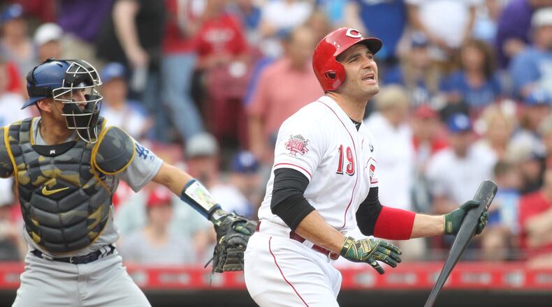 The Reds’ Joey Votto reacts after striking out against the Dodgers on Friday, May 17, 2019, at Great American Ball Park in Cincinnati. David Jablonski/Staff
