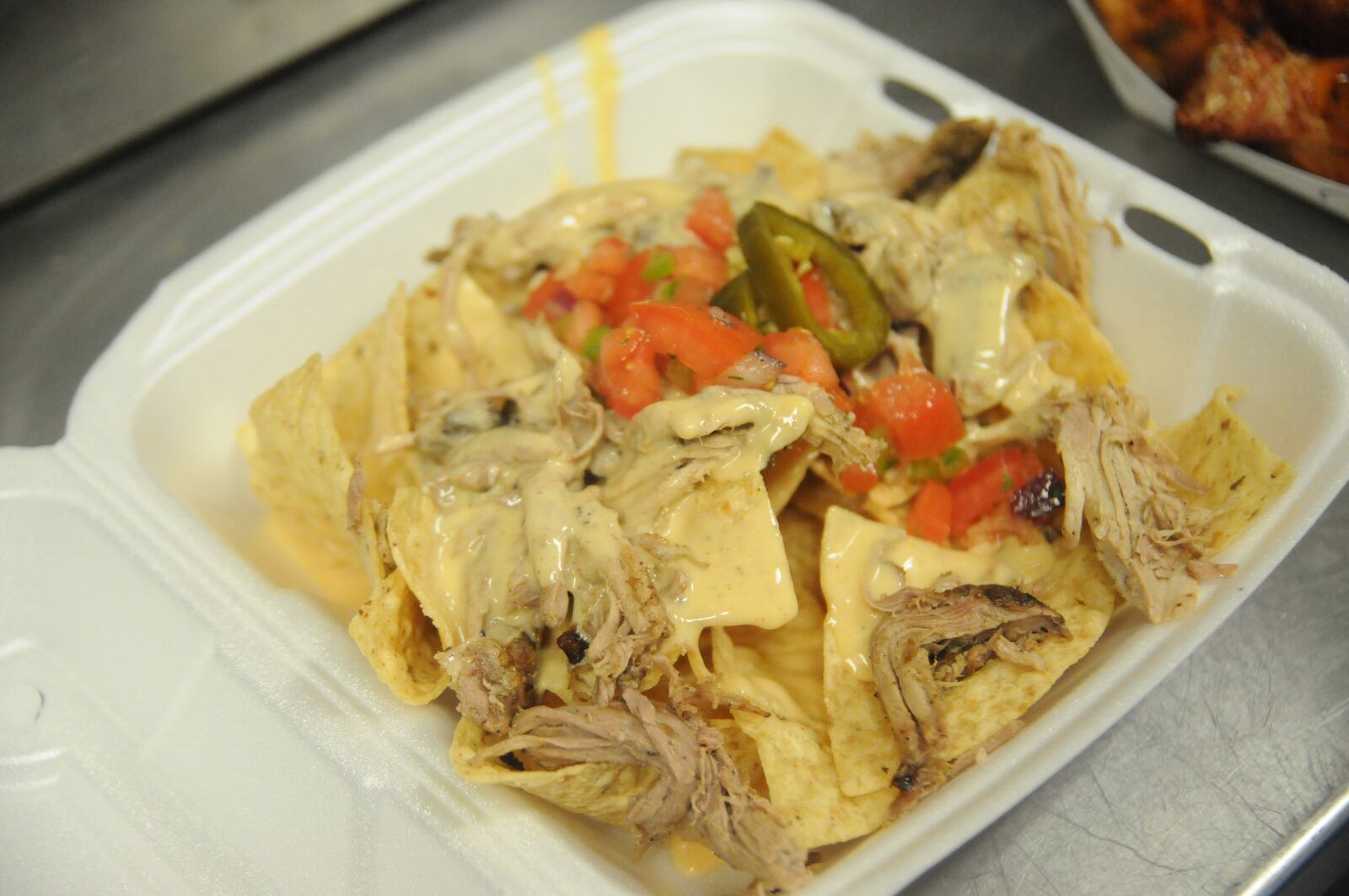 A little rain didn’t stop the feast on Saturday, March 30, 2019, at the first food truck rally on Dorothy Lane near Archer’s Tavern. Here’s who we spotted dishing out and devouring some of the best food truck eats around town. DAVID MOODIE/CONTRIBUTED