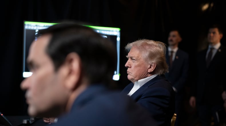In this photo released by the White House, President Donald Trump monitors U.S. military operations in Venezuela, with Secretary of State Marco Rubio at Mar-a-Lago in Palm Beach, Fla., Saturday, Jan. 3, 2026. (Molly Riley/The White House via AP)