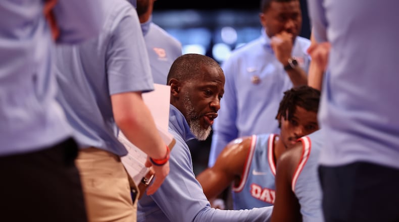 Dayton's Anthony Grant talks to his players during a timeout against Virginia Commonwealth in the Atlantic 10 Conference championship game on Saturday, March 12, 2023, at the Barclays Center in Brooklyn, N.Y. David Jablonski/Staff