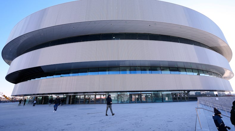 An outside view of the Santa Giulia Ice Hockey Arena, in Milan, where Ice Hockey discipline of the Milan Cortina 2026 Winter Olympics will take place, in Milan, Italy, Sunday, Jan. 11, 2026. (AP Photo/Luca Bruno)