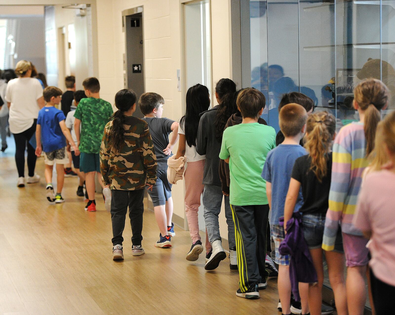 Students at the Fairborn Intermediate School head back to class after lunch. MARSHALL GORBY\STAFF