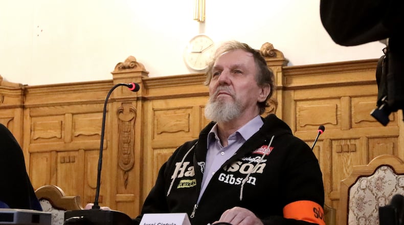 Juraj Cintula, who shot and seriously injured Prime minister of Slovakia Robert Fico last year,attends hearings at the Specialized Criminal Court in Banska Bystrica, Slovakia, Tuesday, Oct. 21, 2025. (Jan Kroslak/TASR via AP)