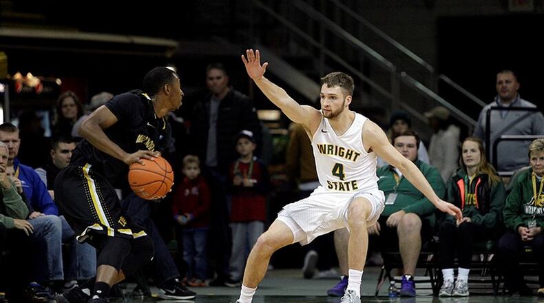 Wright State’s Alan Vest (4) defends during Monday night’s game vs. Ohio Dominican at the Nutter Center. Tim Zechar / Contributed Photo