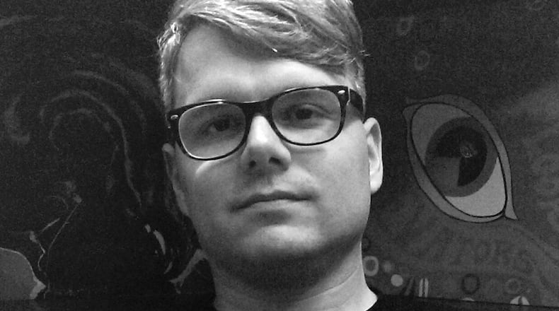 T.J. McGuire, whose debut poetry collection Mid-Life Chrysler was recently published. CONTRIBUTED