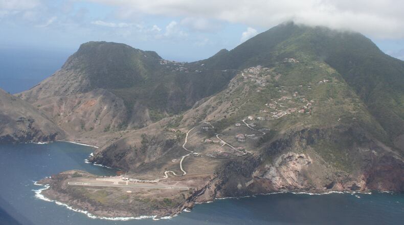 Saba as seen from the window of Winair flight to St. Maarten. Note the world’s shortest commercial airstrip and the Road, the island’s only road. (Mary Ann Anderson/TNS)