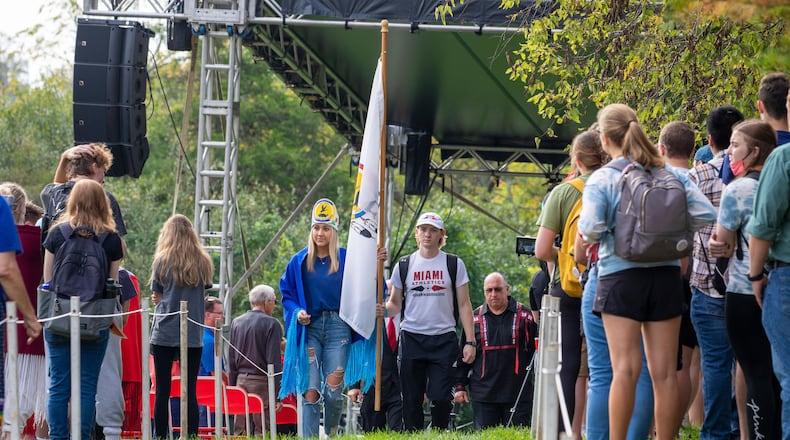Miami Tribe students begin a processional through Miami University's campus on a Walk of Remembrance on Oct. 11, 2021. On Oct. 11, 1846, nearly 330 members of the Miami Tribe were removed from the homes in Oxford and relocated to what's now known as Kansans and eventually Oklahoma. PHOTO: MIAMI UNIVERSITY