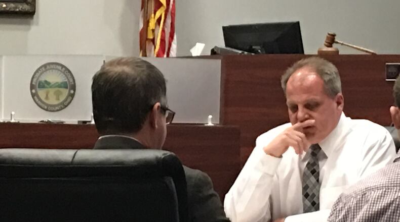 Judge Joe Kirby allowed an 11-year-old Warren County boy to go home with his aunt after being charged with threatening to shooting up his elementary school and another student. Kirby is pictured earlier this month at the defense table in Warren County Juvenile Court, discussing another case.Staff photo by Lawrence Budd