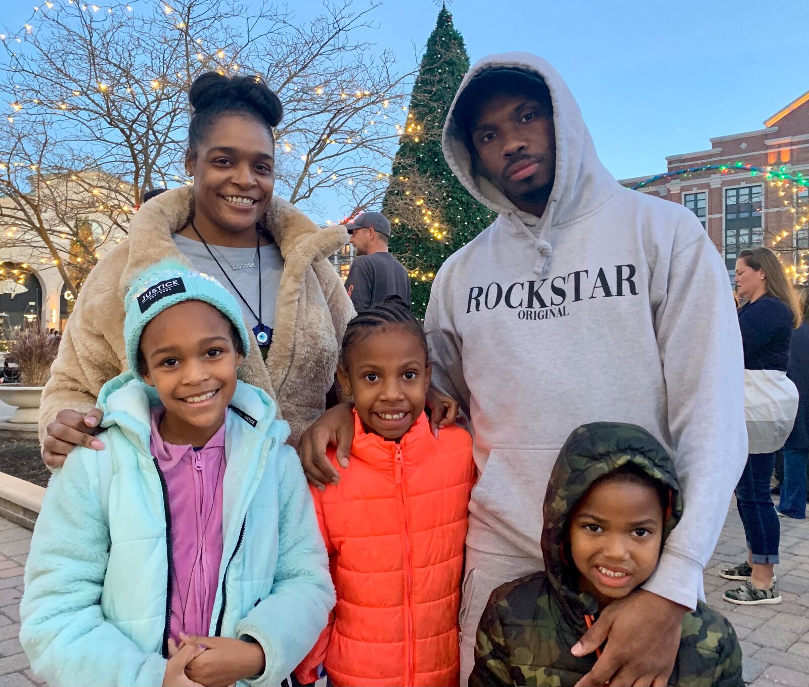 Chanel and Bally Banks and their kids, from left: Mackenzie, Camilla and Marcus, at the Greene’s tree lighting Nov. 16, 2023. LONDON BISHOP/STAFF