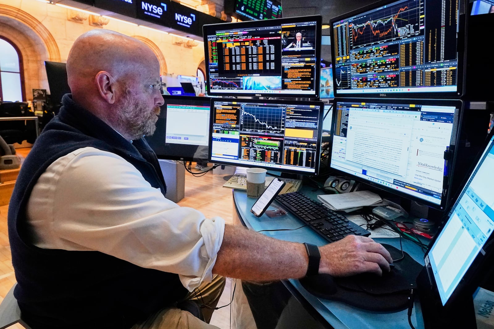 Trader Steven Gohl works on the floor of the New York Stock Exchange, Monday, July 21, 2025. (AP Photo/Richard Drew)