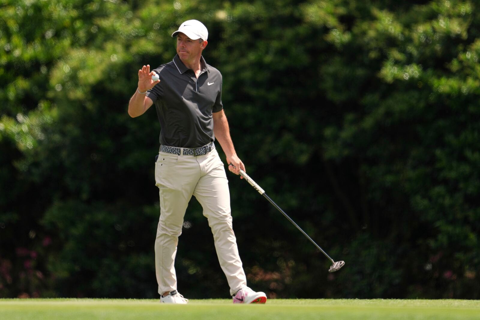 Rory McIlroy, of Northern Ireland, waves after making a putt on the 12th hole during the second round at the Masters golf tournament, Friday, April 11, 2025, in Augusta, Ga. (AP Photo/Matt Slocum)