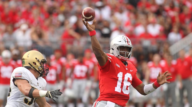 Ohio State’s J.T. Barrett throws a pass against Army on Saturday, Sept. 16, 2017, at Ohio Stadium in Columbus. David Jablonski/Staff