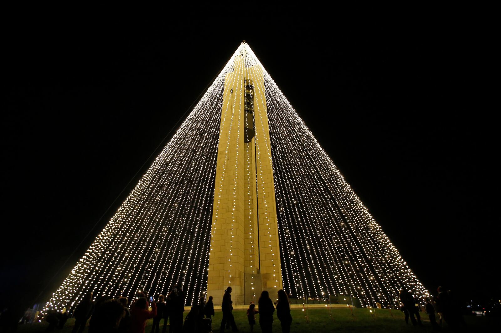 The 20,000-light Carillon Holiday Tree was lit on Wednesday evening to kick off the Holiday festivities at Carillon Historic Park and Dayton History.  TY GREENLEES / STAFF