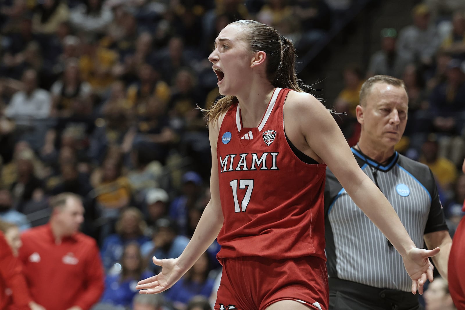 Miami (Ohio) guard Nuria Jurjo (17) reacts after a foul call in the first half against West Virginia in the first round of the NCAA college basketball tournament, Saturday, March 21, 2026, in Morgantown, W.Va. (AP Photo/Kathleen Batten)
