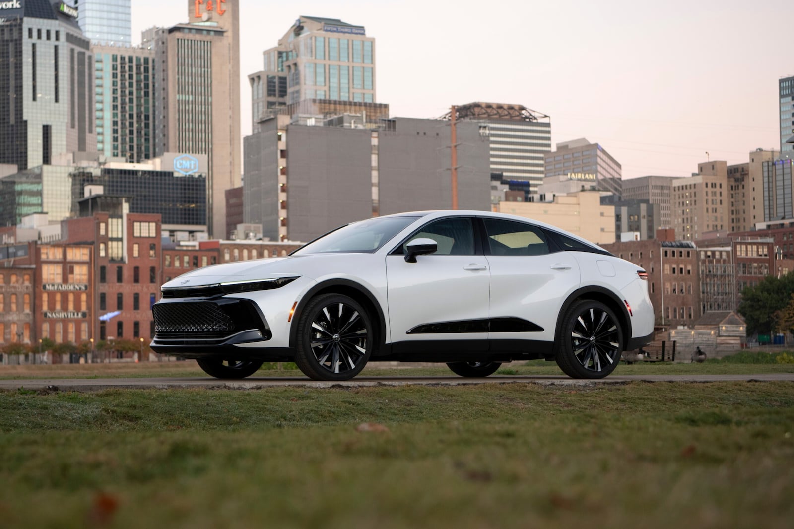 This photo provided by Toyota shows the 2025 Crown. The Crown is a big sedan with a distinctive, raised look. Its hybrid powertrain also helps it get up to an estimated 41 mpg combined. (Courtesy of Toyota Motor Sales U.S.A. via AP)