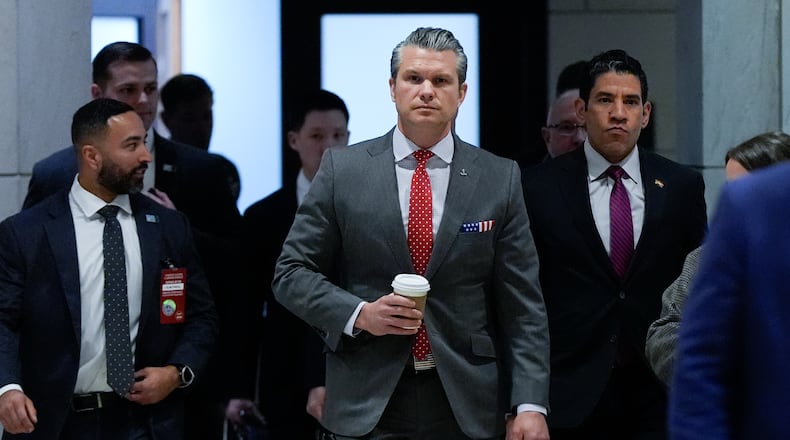 Defense Secretary Pete Hegseth arrives to brief members of Congress on military strikes near Venezuela, Tuesday, Dec. 16, 2025, at the Capitol in Washington. (AP Photo/Julia Demaree Nikhinson)