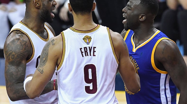 CLEVELAND, OH - JUNE 10:  LeBron James #23 of the Cleveland Cavaliers exchanges words with Draymond Green #23 of the Golden State Warriors during the second half in Game 4 of the 2016 NBA Finals at Quicken Loans Arena on June 10, 2016 in Cleveland, Ohio. NOTE TO USER: User expressly acknowledges and agrees that, by downloading and or using this photograph, User is consenting to the terms and conditions of the Getty Images License Agreement.  (Photo by Jason Miller/Getty Images)