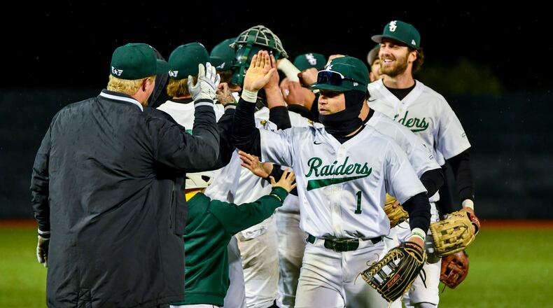 Wright State's Avery Fisher (1) and his teammates celebrate a victory over Ohio State on Tuesday at Nischwitz Stadium. Wright State Athletics photo