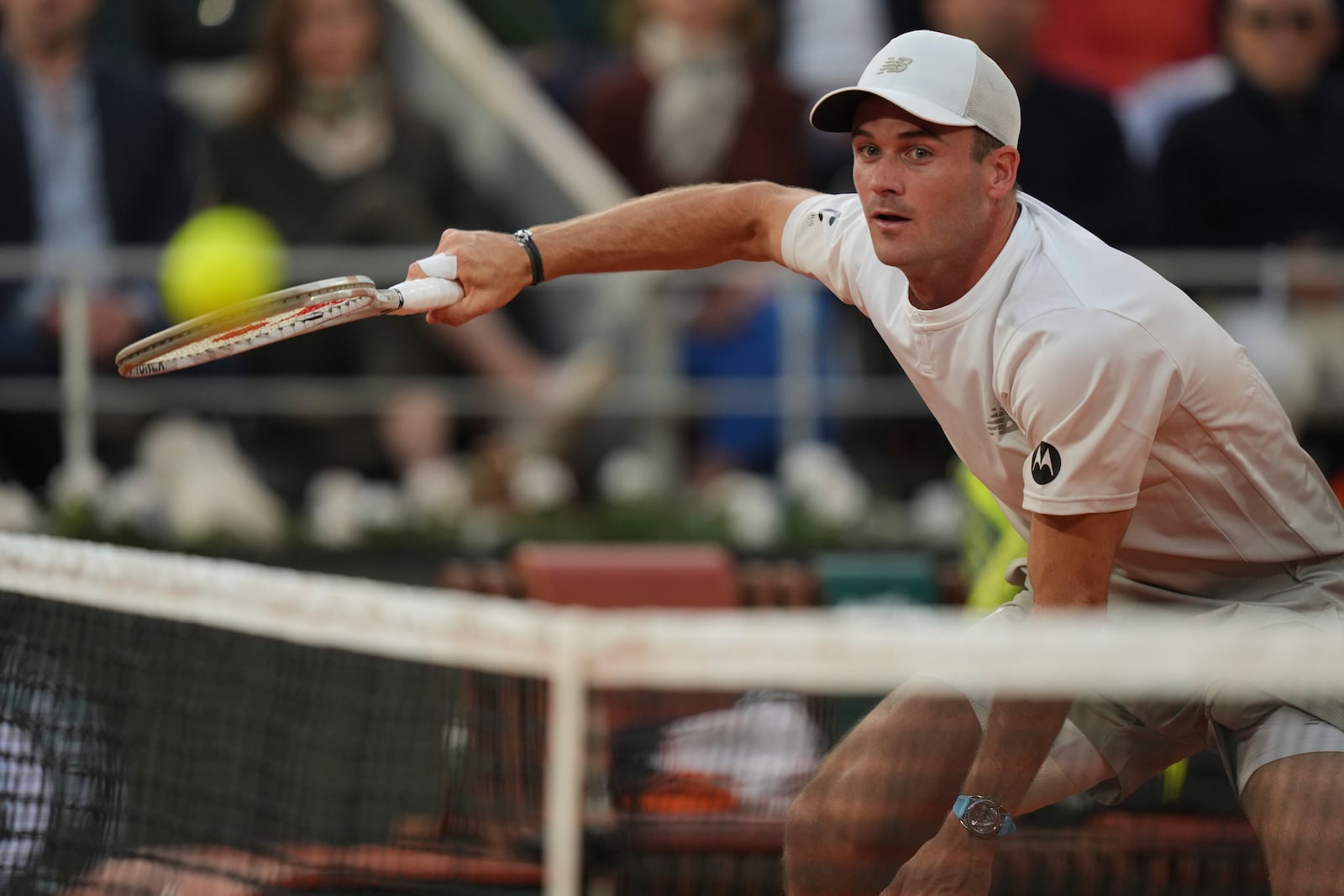 Tommy Paul of the U.S. plays a shot against Spain's Carlos Alcaraz during their quarterfinal match of the French Tennis Open at the Roland-Garros stadium in Paris, Tuesday, June 3, 2025. (AP Photo/Thibault Camus)
