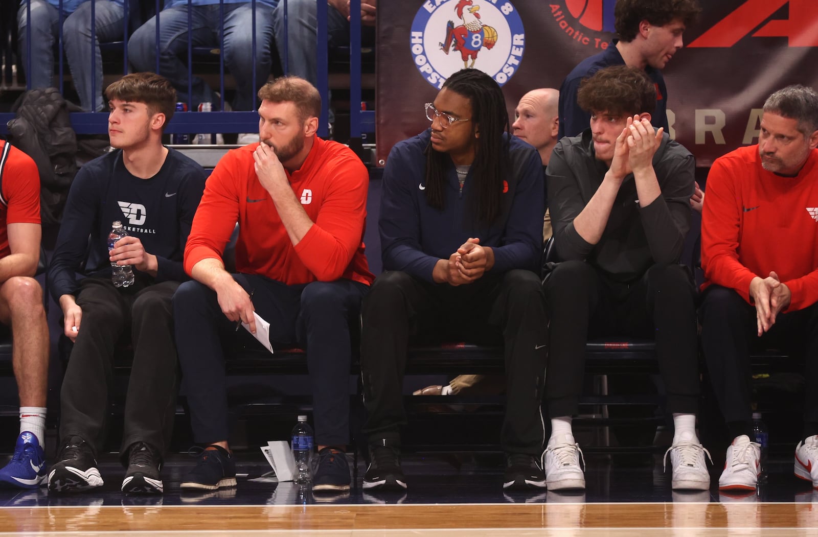 Dayton's injured players watch from the bench during a game against Duquesne on Tuesday, Jan. 13, 2026, at the UPMC Cooper Fieldhouse in Pittsburgh. David Jablonski/Staff