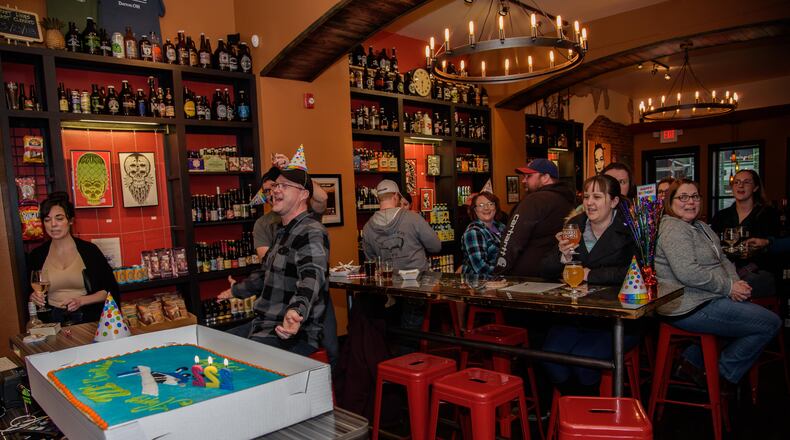 The Barrel House celebrated Dayton's 222 birthday by tapping beer from local breweries, serving food from Underdogs Mobile and featuring entertainment by Dayton musicians on Saturday, March 31. PHOTO / TOM GILLIAM PHOTOGRAPHY