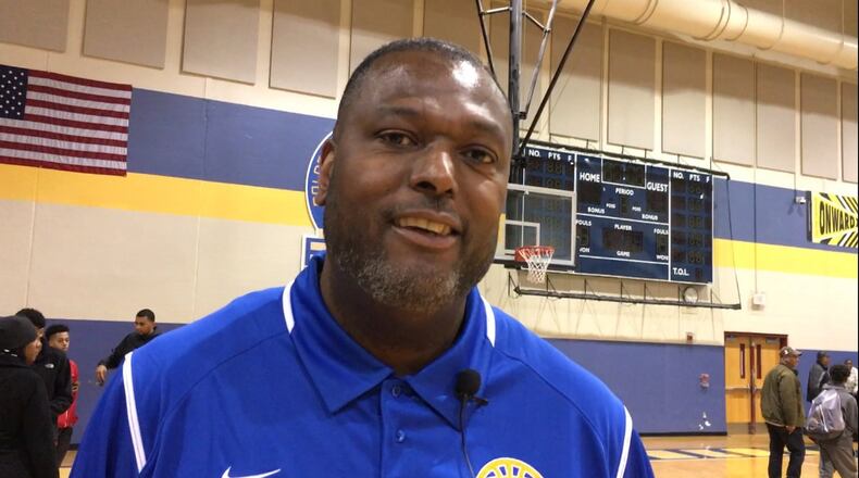 First-year Ponitz High School boys varsity basketball coach Steve Pittman led the Golden Panthers to a 63-45 defeat of visiting Oakwood on Dec. 27, 2016. MARC PENDLETON / STAFF