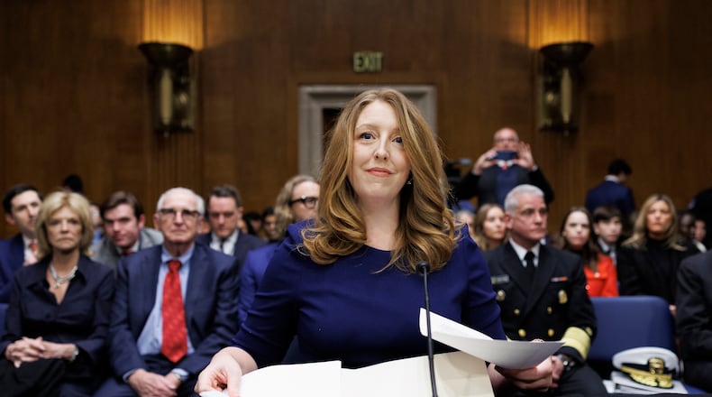 Dr. Casey Means takes her seat at the start of a Senate Health, Education Labor and Pension Committee confirmation hearing for U.S. Surgeon General on Capitol Hill Wednesday, Feb. 25, 2026, in Washington. (AP Photo/Tom Brenner)