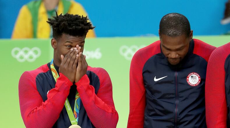 Jimmy Butler, and Kevin Durant, react on the podium following the Men's Gold medal game on Day 16 of the Rio 2016 Olympic Games at Carioca Arena 1 on August 21, 2016 in Rio de Janeiro, Brazil. (Photo by Christian Petersen/Getty Images)