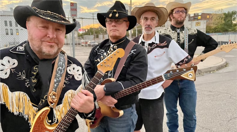 Local honky-tonk country act Golden Guy and His Bucking Bloviators, (left to right) Golden Guy, Col. Poppin, Lanky Luke and Plectrum, celebrate the new Atom Records release, “Personal Pain,” at Hidden Gem Music Club in Centerville on Friday, Oct. 20.