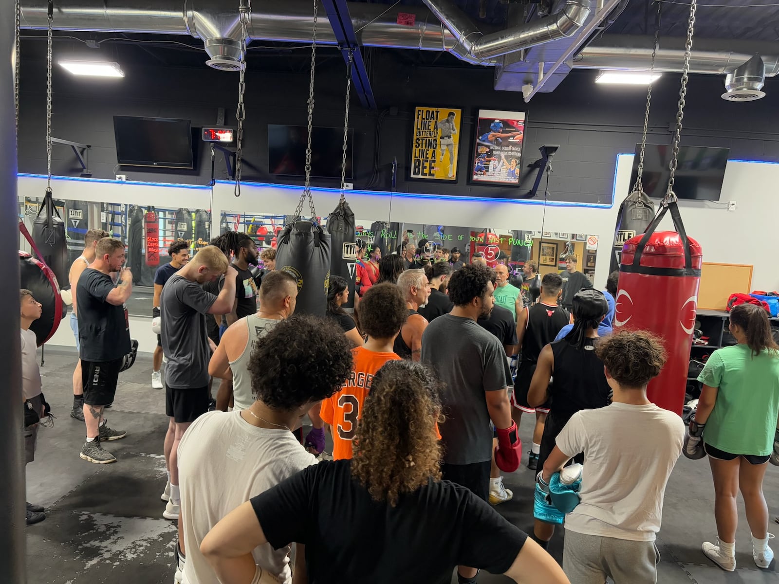 The fighters of the DMC Boxing Academy were called together at the end of Wednesday night’s training session by gym owner and head trainer Daniel Meza-Cuadra for a  quick meeting which he began with a grin as he said half-jokingly, “I don’t know what language I should be speaking to you: English, Spanish, Uzbek , Arabic, Turkish, Ukrainian or something else.” TOM ARCHDEACON/CONTRIBUTED PHOTO