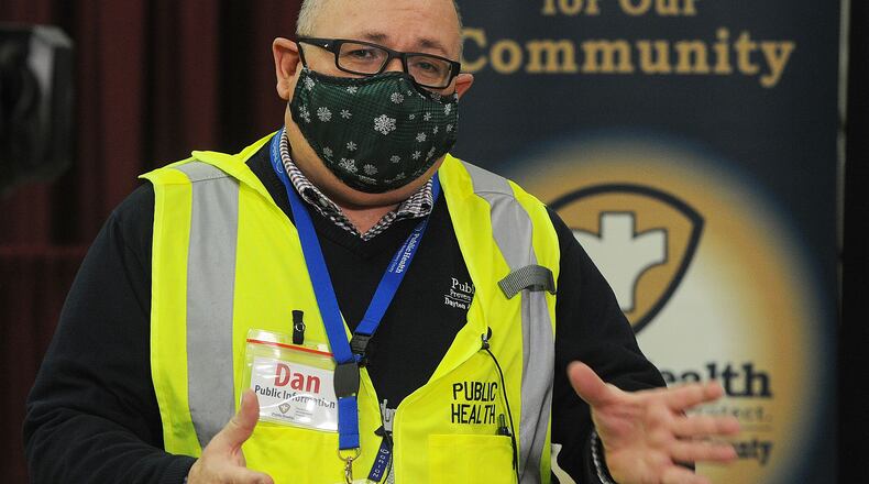 Dan Suffoletto, Public Information Supervisor at Public Health Dayton & Montgomery County, talks about the COVID-19 vaccination clinic at the Dayton Conevtion Cener Wednesday morning, Jan. 20, 2021. MARSHALL GORBY\STAFF