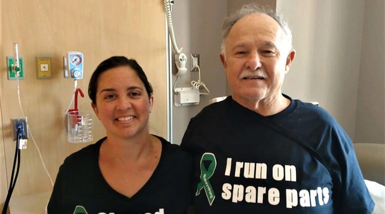 Staff Sgt. Melissa Sherman, 445th Aerospace Medicine Squadron, poses for a photo with her father, Gary Meager, an hour after they both underwent kidney transplant surgery at Banner-University Medical Center in Phoenix July 17, 2019. (Courtesy photo)