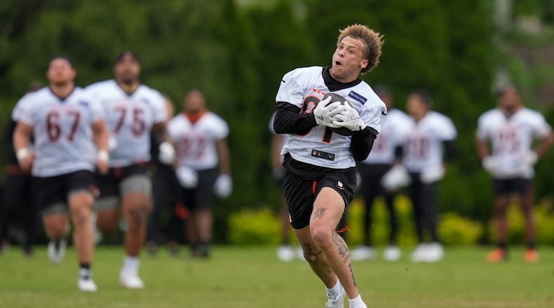 Cincinnati Bengals wide receiver Jermaine Burton catches a pass during the NFL football team's practice on Tuesday, May 14, 2024, in Cincinnati. (AP Photo/Carolyn Kaster)