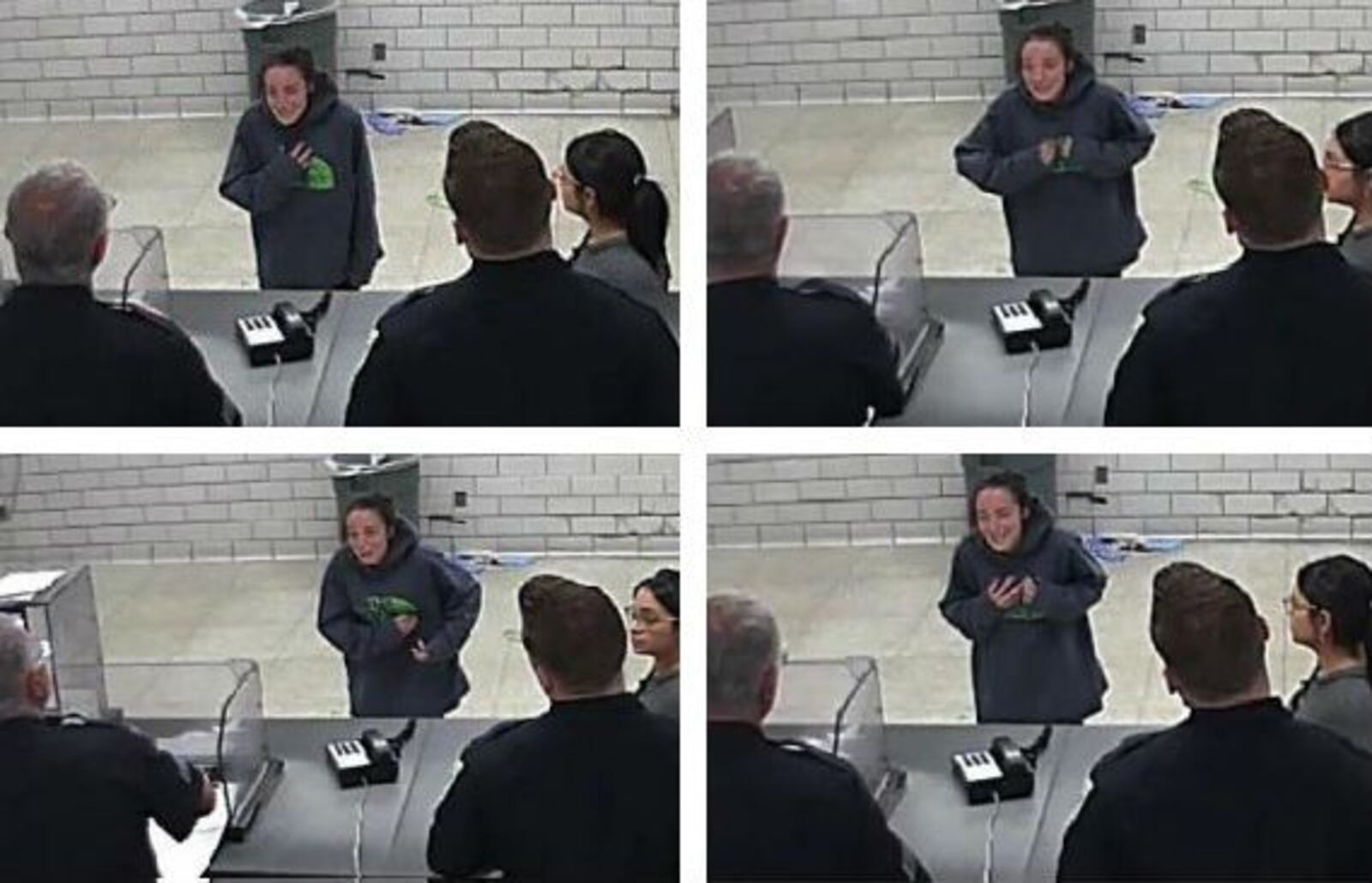 Madelyn Linsenmeir, 30, cries and points to her chest Sept. 29, 2018, at the Springfield Police Department in Springfield, Mass. Linsenmeir died Oct. 4 of a heart infection while in police custody.