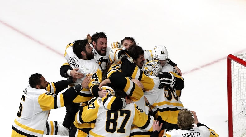 NASHVILLE, TN - JUNE 11: Matt Murray #30 of the Pittsburgh Penguins celebrates with teammates after they defeated the Nashville Predators 2-0 to win the 2017 NHL Stanley Cup Final at the Bridgestone Arena on June 11, 2017 in Nashville, Tennessee. (Photo by Patrick Smith/Getty Images)