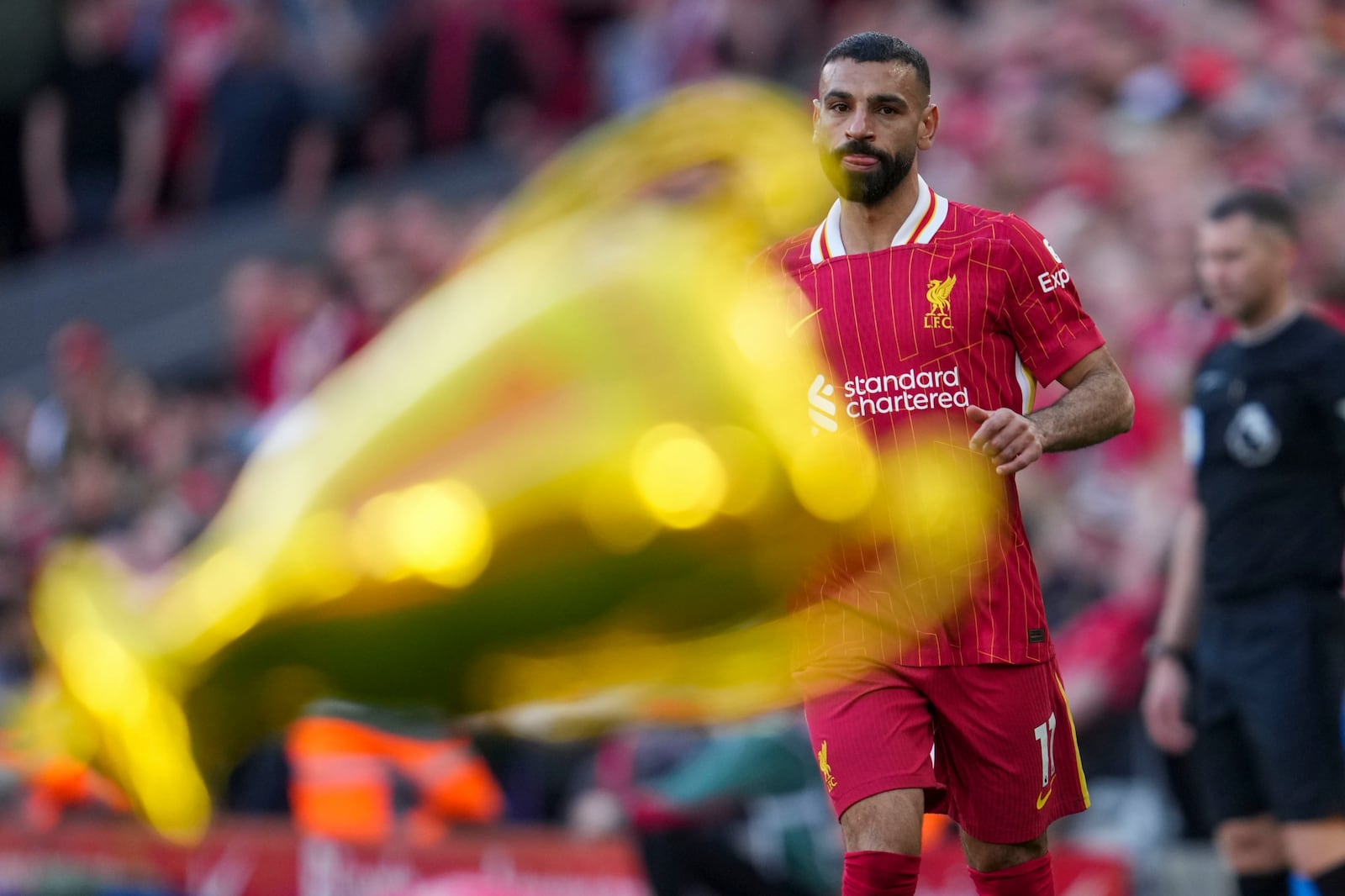 Liverpool's Mohamed Salah in action during the English Premier League soccer match between Liverpool and Tottenham Hotspur at Anfield in Liverpool, England, Sunday, April 27, 2025. (AP Photo/Jon Super)