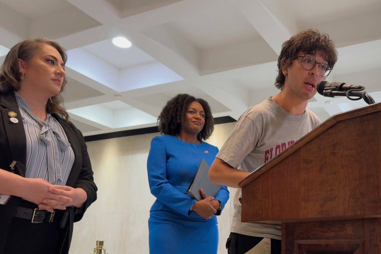 Natanel Mizrahi, a 22-year-old junior at Florida State University, speaks at a news conference in the state capitol in Tallahassee, Fla. alongside Democratic lawmakers. (AP Photo/Kate Payne)