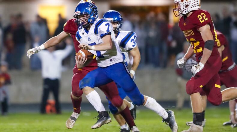 Brookville senior Tim Davis runs past several Northeastern defenders during their Division V, Region 20 quarterfinal game on Friday night at Conover Field in Springfield. CONTRIBUTED PHOTO BY MICHAEL COOPER