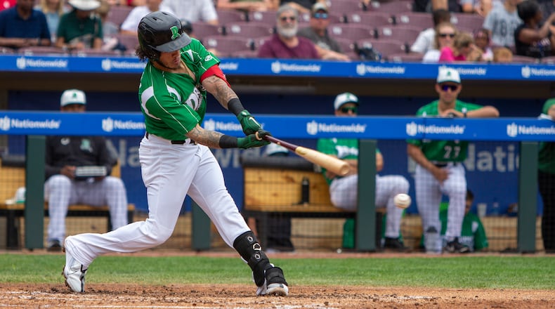 Dayton's Nick Quintana swings and misses during a third-inning strikeout in Sunday's game against Great Lakes at Day Air Ballpark. CONTRIBUTED/Jeff Gilbert