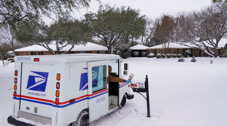 A plan is being considered in Riverside to prohibit parking that blocks postal service access to mailboxes, an issue more than a dozen other area cities said they have no law against. (Smiley N. Pool/The Dallas Morning News via AP)