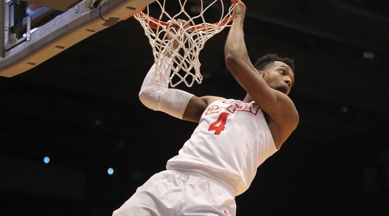 Dayton’s Charles Cooke misses a dunk in the first half. David Jablonski/Staff