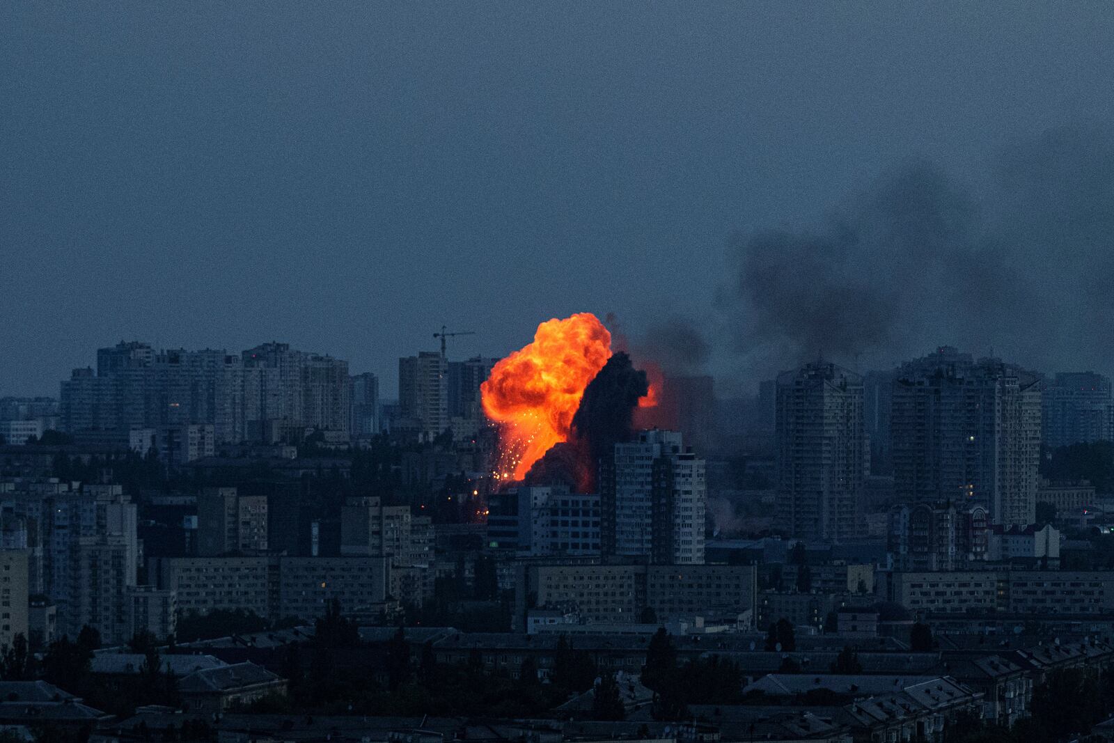 Explosion is seen after Russian air strike on Kyiv, Ukraine, on Friday, June 6, 2025. (AP Photo/Evgeniy Maloletka)