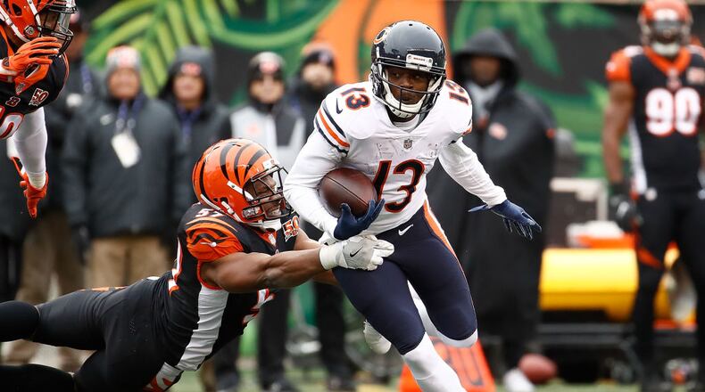 CINCINNATI, OH - DECEMBER 10: Kendall Wright #13 of the Chicago Bears breaks a tackle from Vincent Rey #57 of the Cincinnati Bengals during the first half at Paul Brown Stadium on December 10, 2017 in Cincinnati, Ohio. (Photo by Andy Lyons/Getty Images)