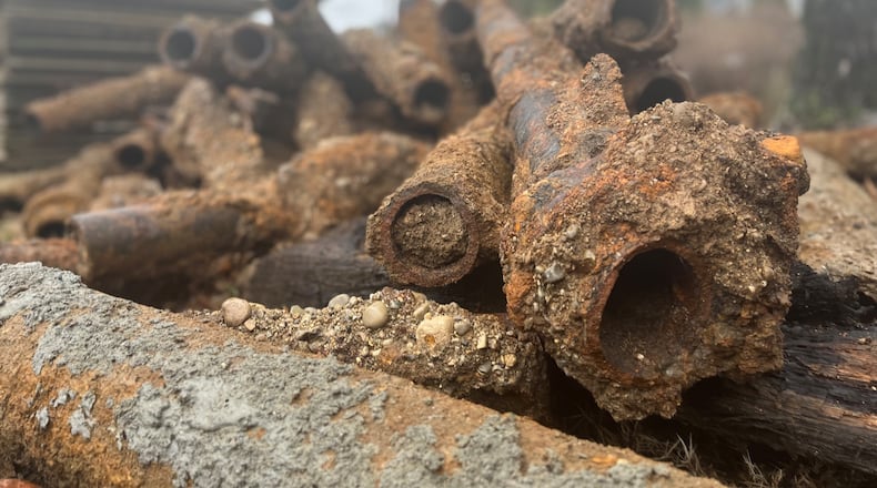 Old and likely abandoned utility pipes that were removed in the South Park area. New water mains are being installed on multiple streets in South Park, and these pipes may have been removed during the infrastructure project. CORNELIUS FROLIK / STAFF